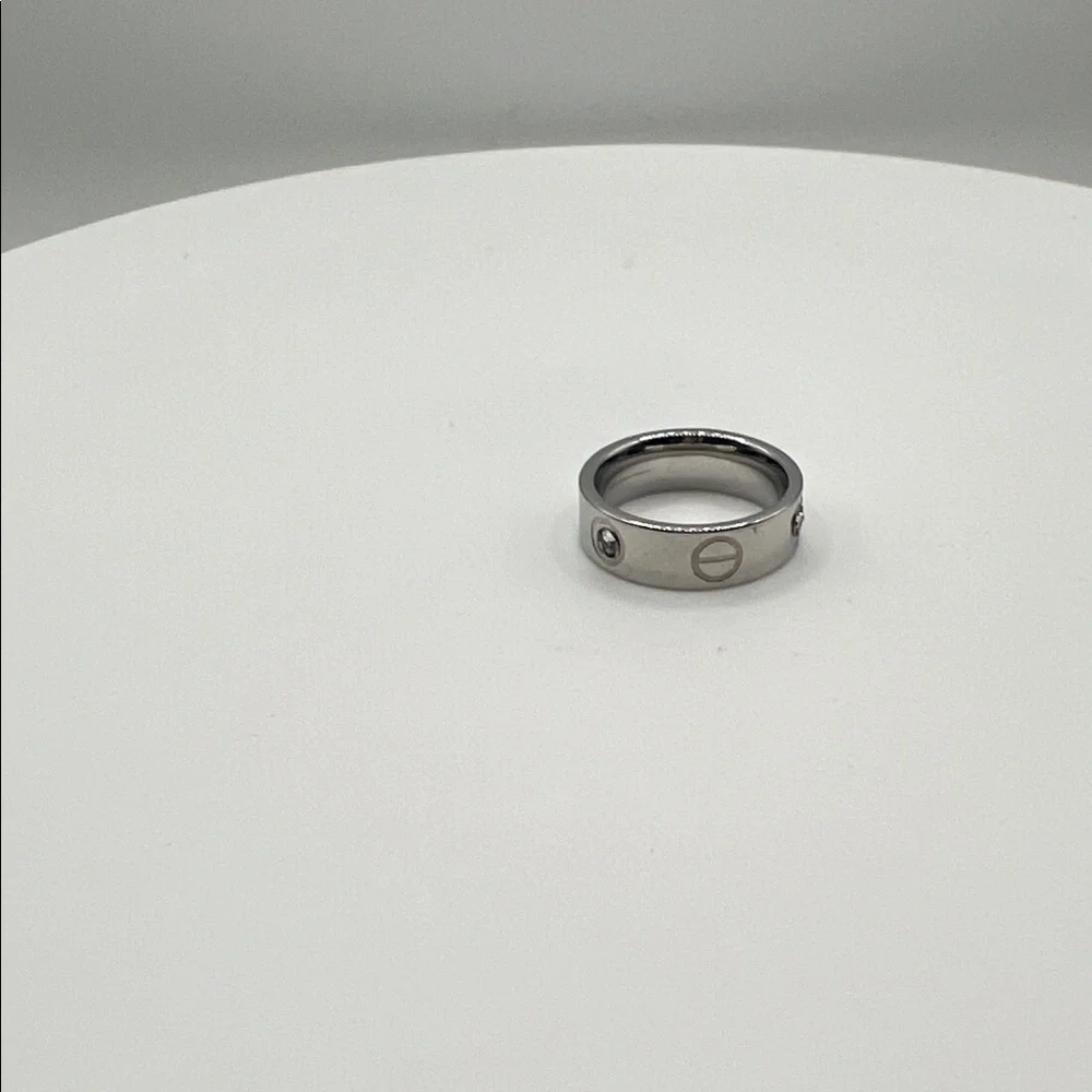 163. Silver Ring with Engraved Design and‎ Stones